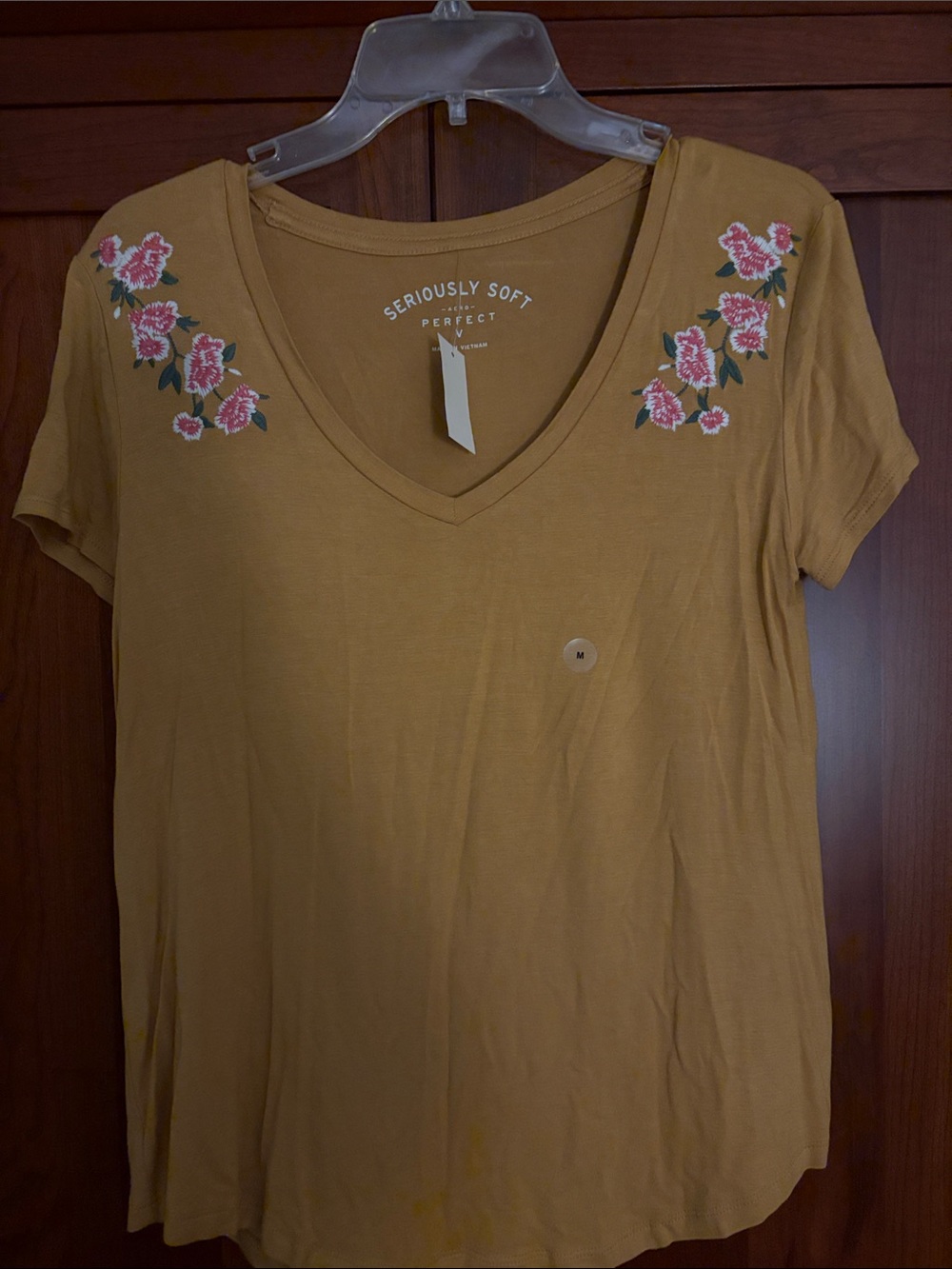 American Eagle Outfitters Mustard V-Neck Tee with Pink Floral Embroidery